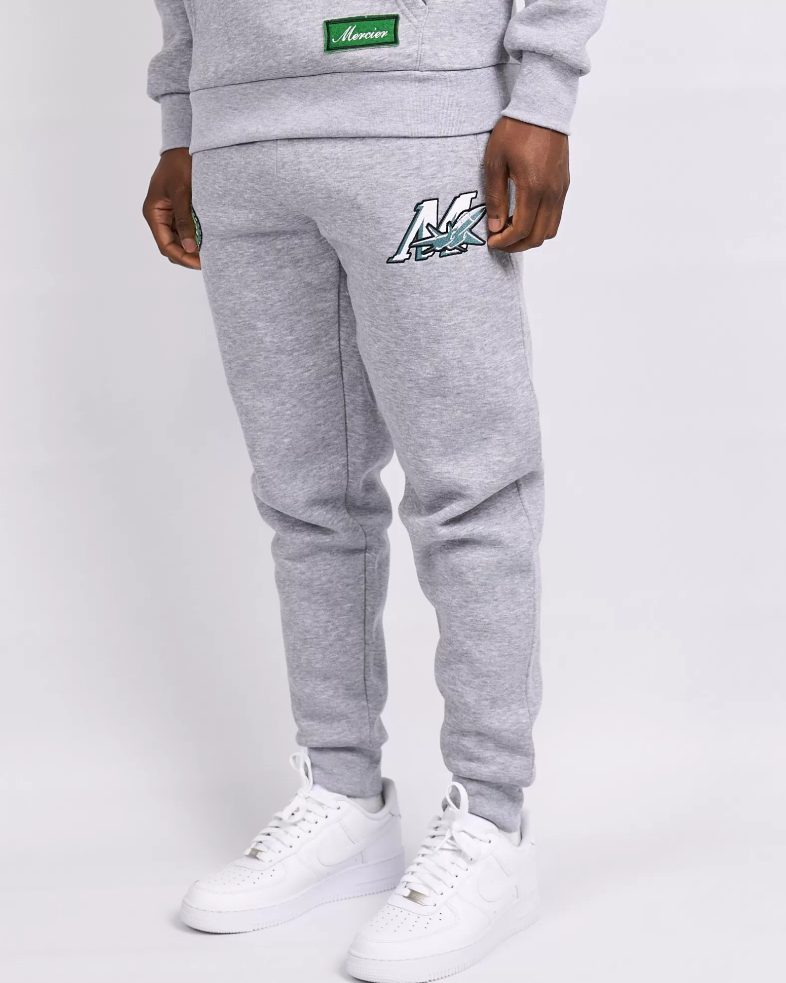 grey_marl_empire_mercier_joggers_3.webp Shop Mercier Grey Marl Empire Joggers
