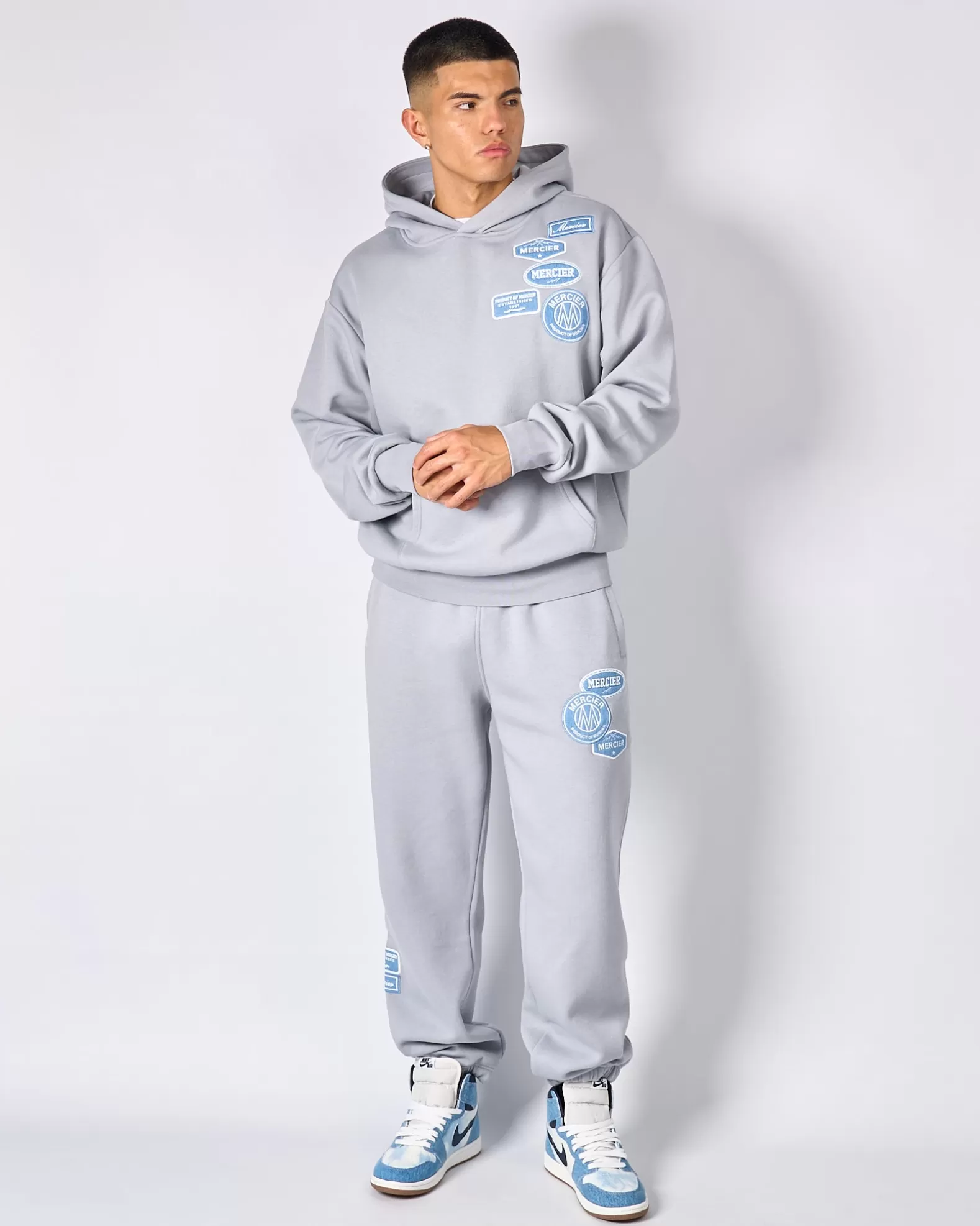 smoke_grey_denim_og_badge_joggers_2.webp Shop Mercier Smoke Grey Denim OG Badge Joggers