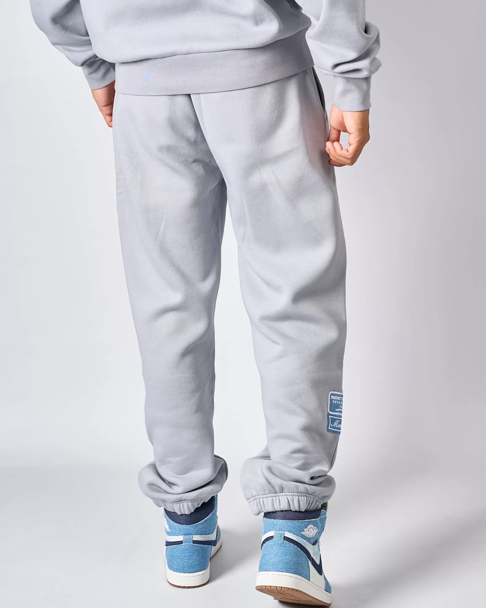 smoke_grey_denim_og_badge_joggers_4.webp Shop Mercier Smoke Grey Denim OG Badge Joggers