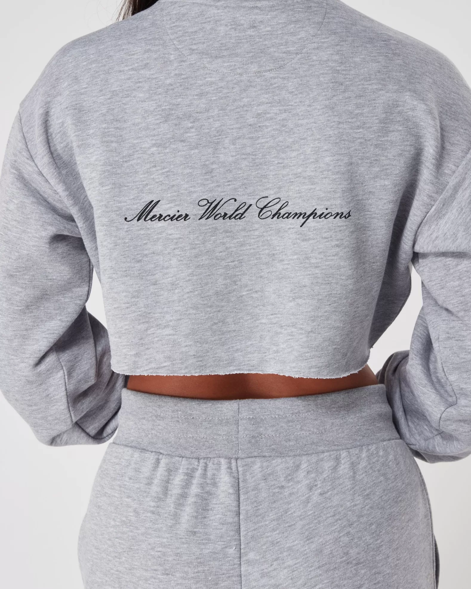 womens_grey_marl_champions_crop_crewneck_3.webp Store Mercier Womens Grey Marl Champions Crop Crewneck