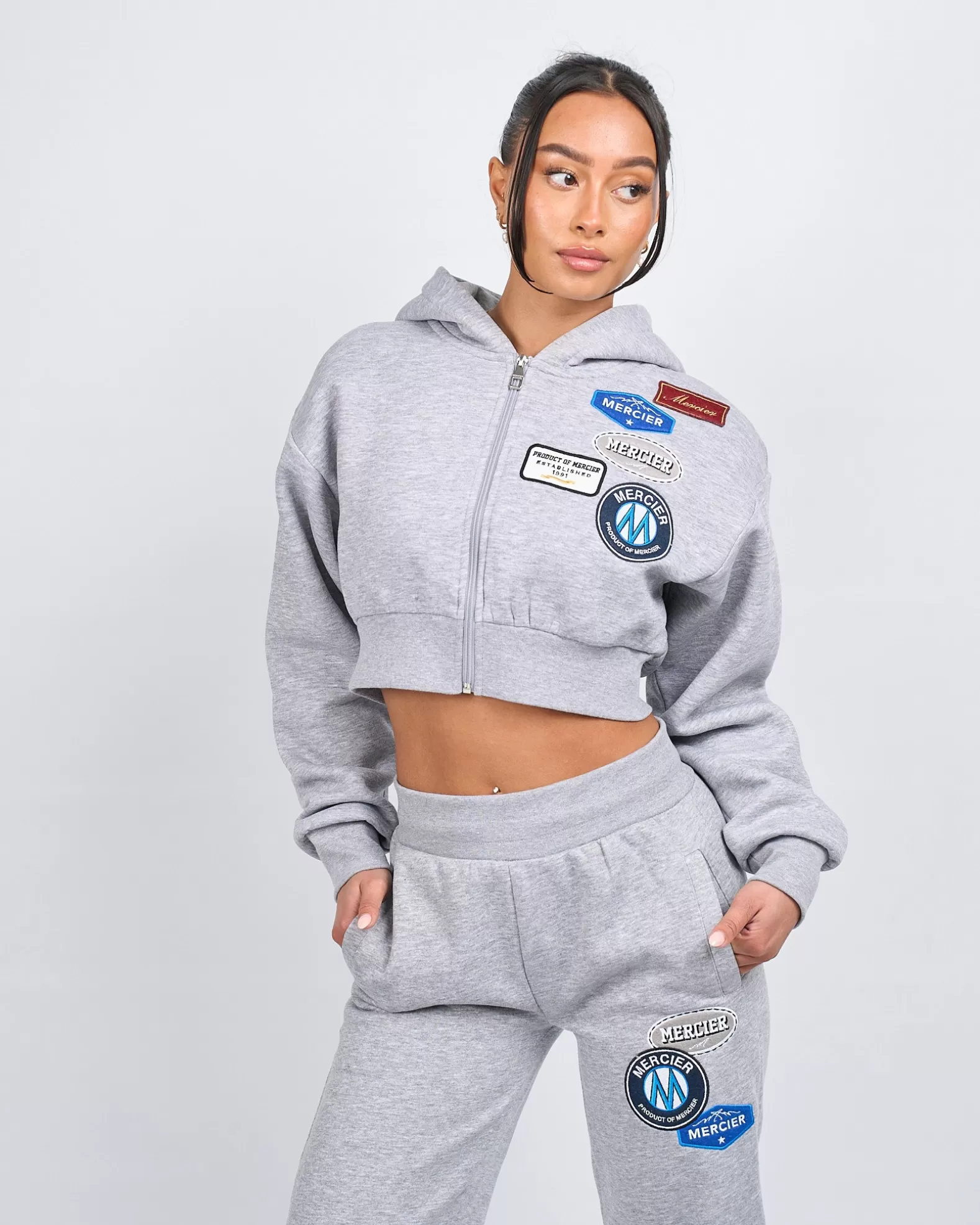 womens_grey_marl_og_badge_crop_zip_hoodie_3.webp Fashion Mercier Women's Grey Marl OG Badge Crop Zip Hoodie